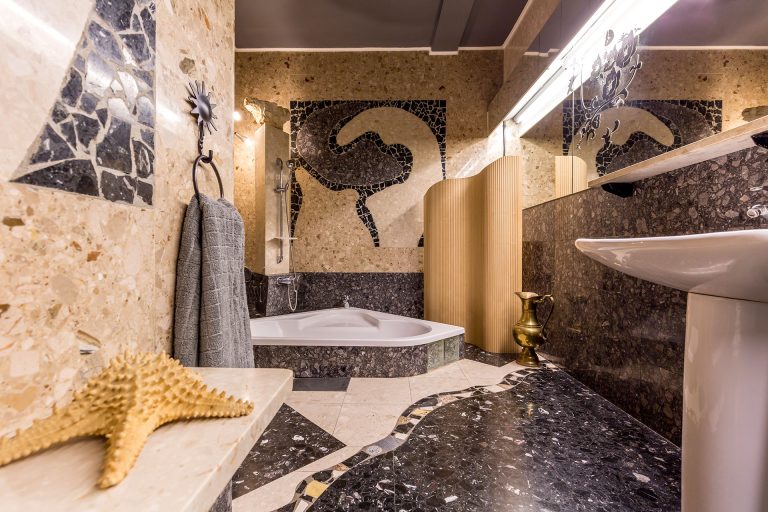 spacious-bathroom-with-mosaic-patterns-2024-10-20-19-59-48-utc