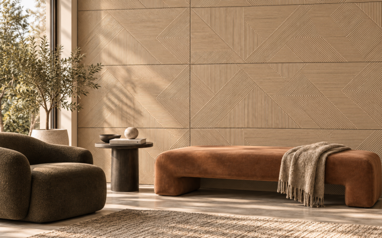 Modern living room featuring beige geometric textured wall tiles, warm neutral tones, contemporary furniture, and natural sunlight.